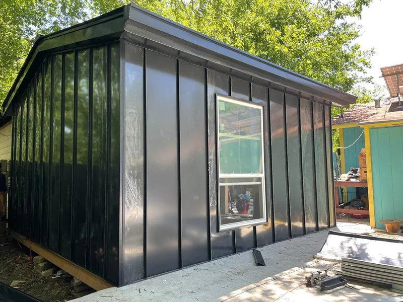 Black standing seam metal wall panels for Metal Roof Installation in Wareham